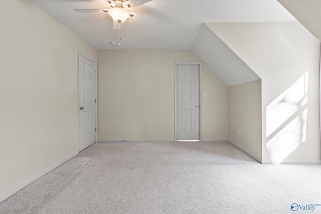 bonus room with ceiling fan, light colored carpet, and lofted ceiling