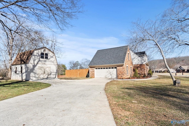 view of side of home featuring a lawn