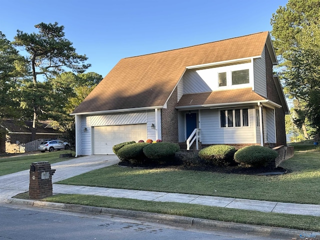 traditional-style home featuring driveway, roof with shingles, an attached garage, a front yard, and brick siding