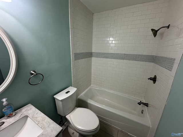 full bath with shower / tub combination, vanity, and toilet