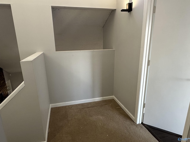 interior space featuring baseboards