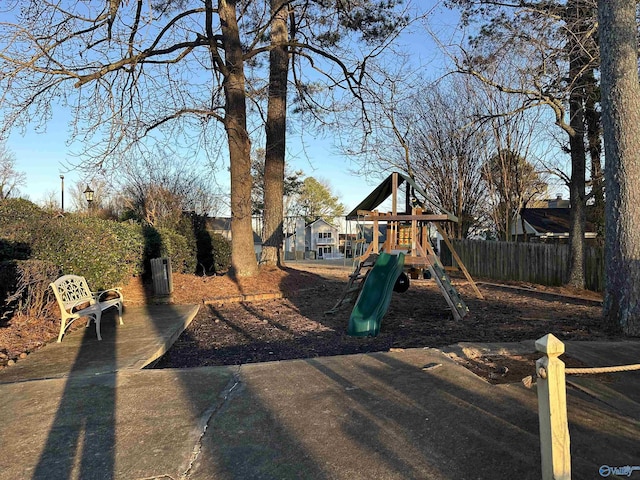 view of play area featuring fence