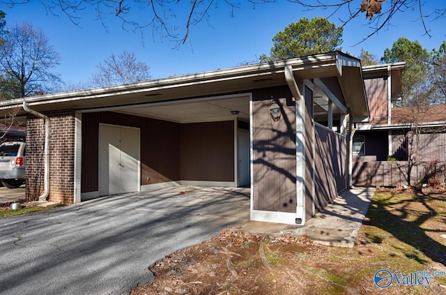 exterior space with a carport