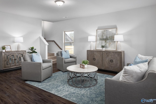 living room with dark hardwood / wood-style flooring