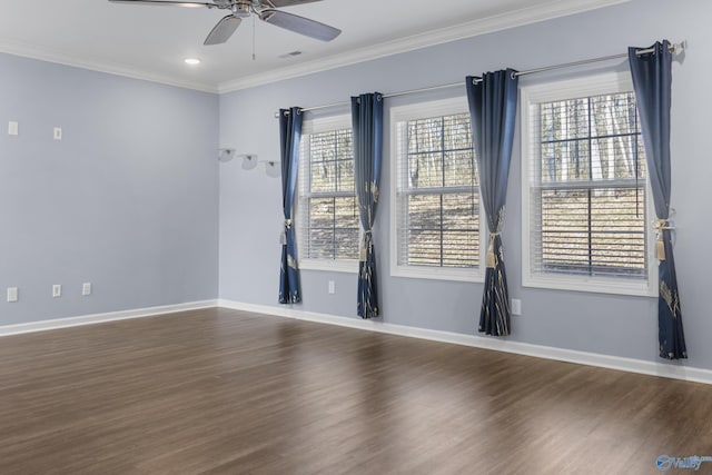 unfurnished room with ceiling fan, dark hardwood / wood-style flooring, and crown molding