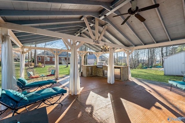 view of patio / terrace featuring ceiling fan, a gazebo, exterior kitchen, and grilling area