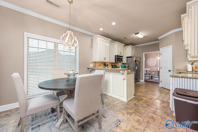 dining room with baseboards, visible vents, recessed lighting, ornamental molding, and a notable chandelier