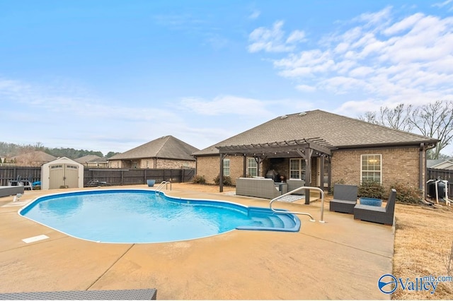 view of swimming pool featuring a pergola, a patio, a fenced backyard, a storage shed, and an outdoor structure