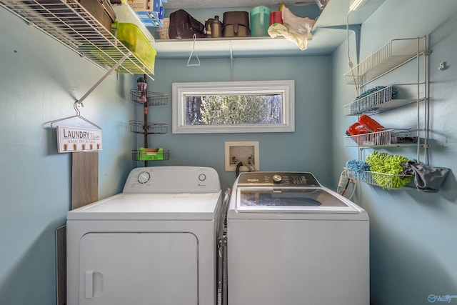 laundry area featuring laundry area and washing machine and dryer