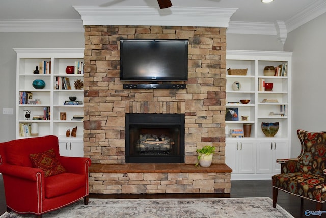 6901 Ridge Pointe Dr SE, Owens Cross Roads, AL 35763 - living area with ornamental molding, a stone fireplace, and dark wood-type flooring