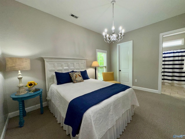 6901 Ridge Pointe Dr SE, Owens Cross Roads, AL 35763 - carpeted bedroom with a chandelier and baseboards