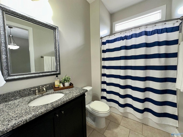 6901 Ridge Pointe Dr SE, Owens Cross Roads, AL 35763 - bathroom featuring toilet, vanity, tile patterned flooring, and a shower with curtain