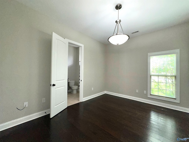 6901 Ridge Pointe Dr SE, Owens Cross Roads, AL 35763 - empty room featuring wood finished floors and baseboards