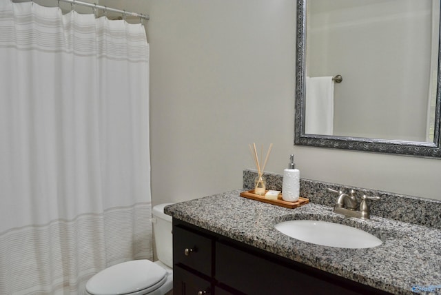 6901 Ridge Pointe Dr SE, Owens Cross Roads, AL 35763 - bathroom with vanity, toilet, and a shower with curtain