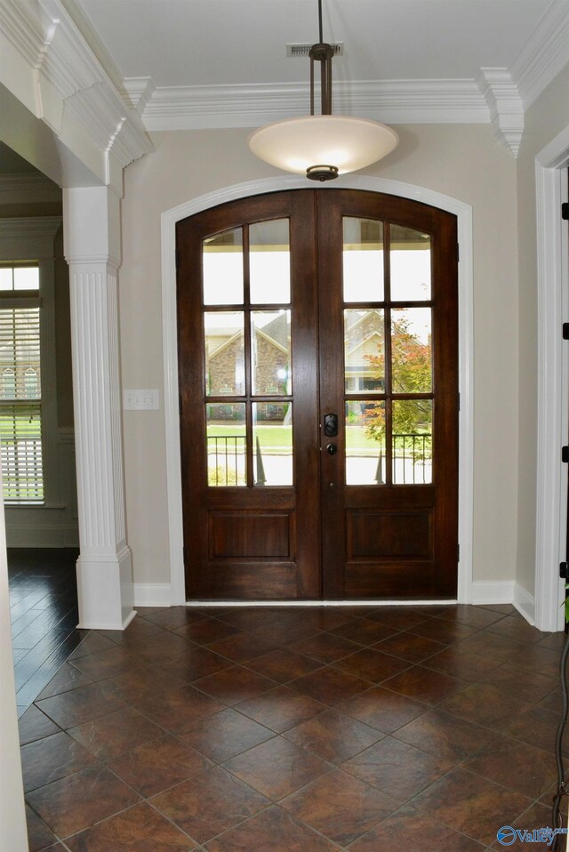 6901 Ridge Pointe Dr SE, Owens Cross Roads, AL 35763 - entryway with baseboards, crown molding, decorative columns, french doors, and dark stone finish flooring