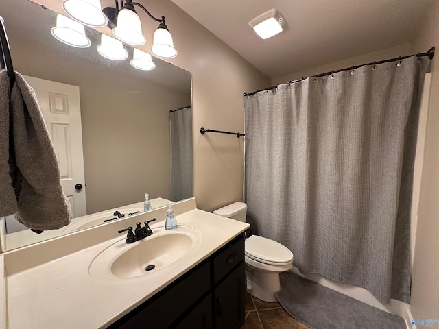 full bath with tile patterned flooring, curtained shower, toilet, a notable chandelier, and vanity