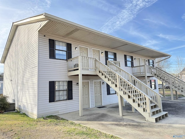 townhome / multi-family property with stairs