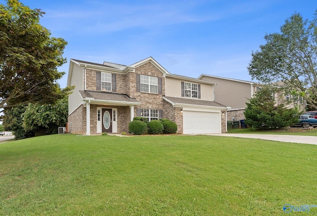 view of front of property featuring a garage, a front lawn, and central air condition unit