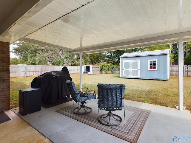 view of patio featuring a storage unit