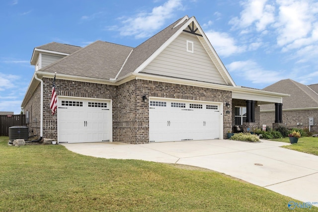 craftsman inspired home featuring a garage, a front lawn, and central AC unit