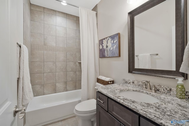 full bathroom with tile patterned floors, shower / bathtub combination with curtain, toilet, and vanity