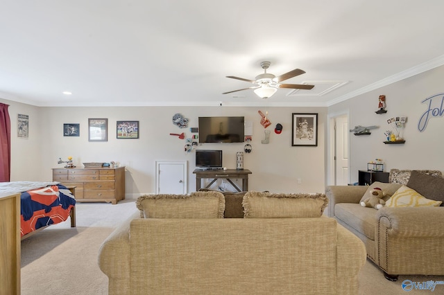 living room featuring ceiling fan, light carpet, and ornamental molding