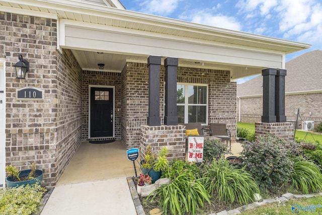 doorway to property featuring a porch