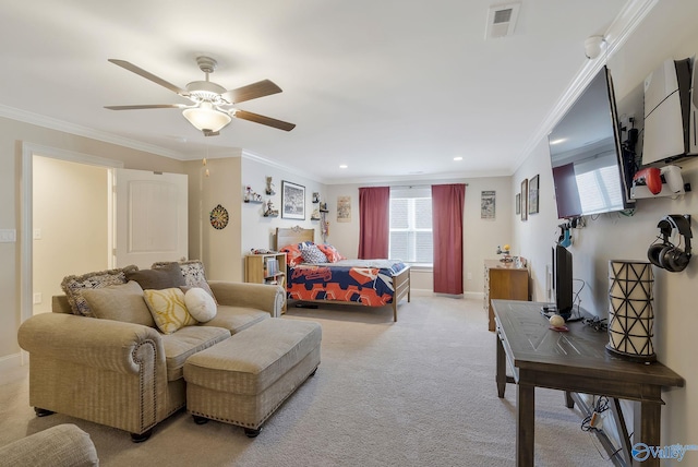 carpeted bedroom featuring ceiling fan and crown molding