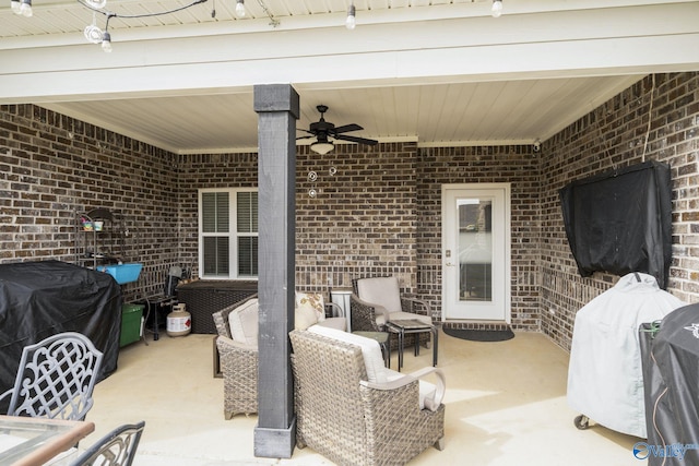 view of patio / terrace with ceiling fan and grilling area