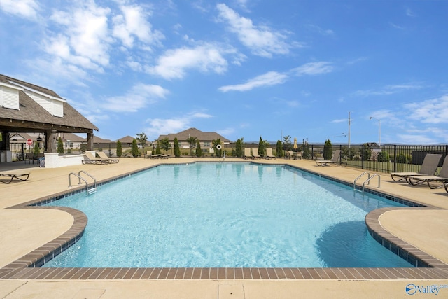 view of swimming pool featuring a patio