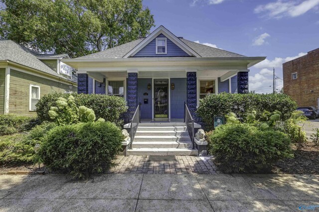 bungalow-style home with covered porch