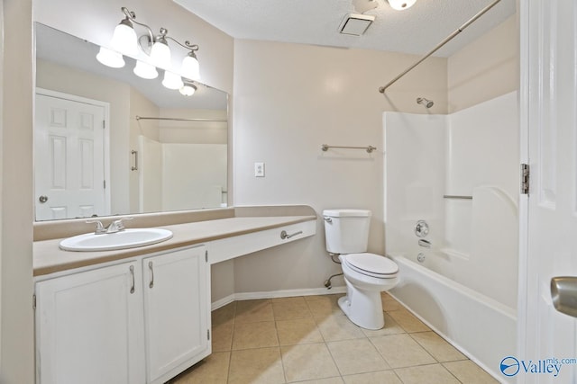 full bathroom with vanity, a textured ceiling, bathtub / shower combination, tile patterned floors, and toilet