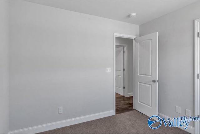 unfurnished bedroom featuring carpet floors