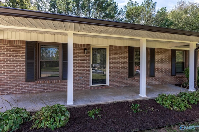 property entrance with a porch