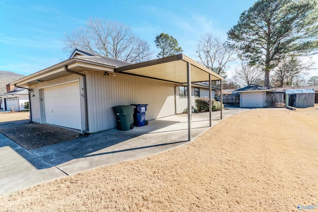 view of side of property with a garage