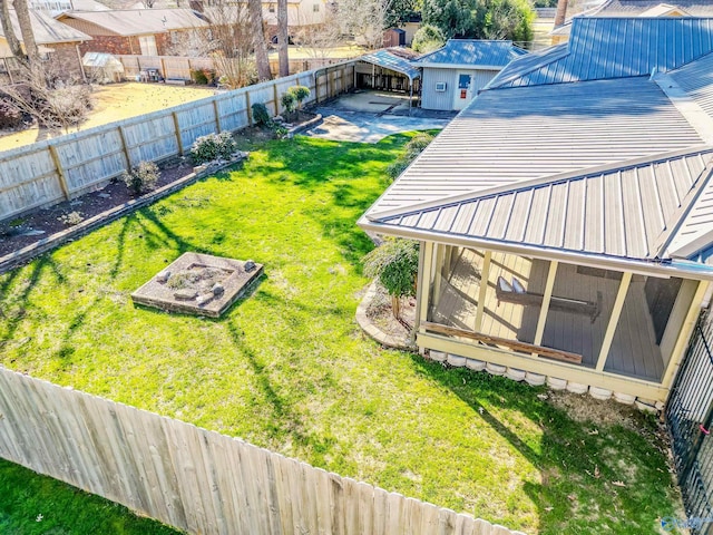 view of yard with a fenced backyard