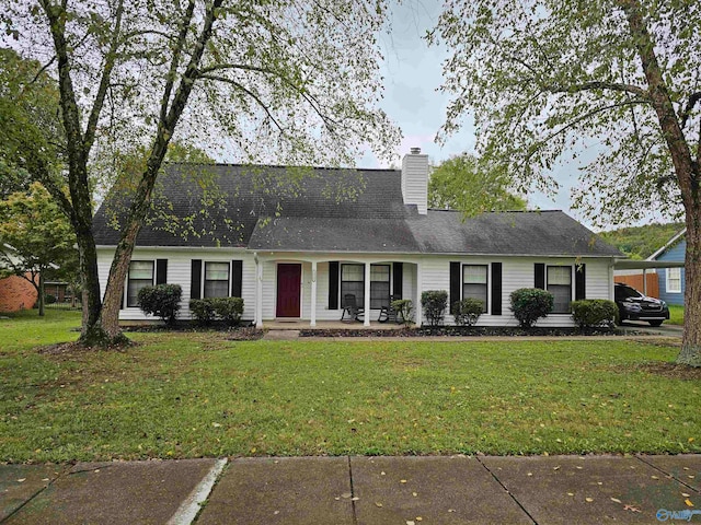 view of front of property with a front lawn