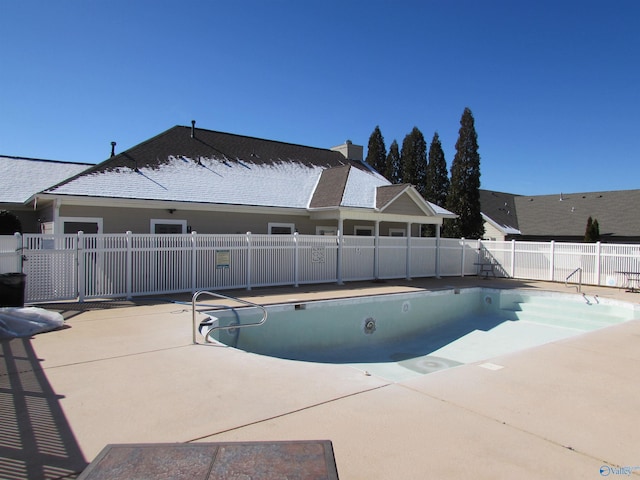 view of pool featuring a patio area, fence, and a fenced in pool