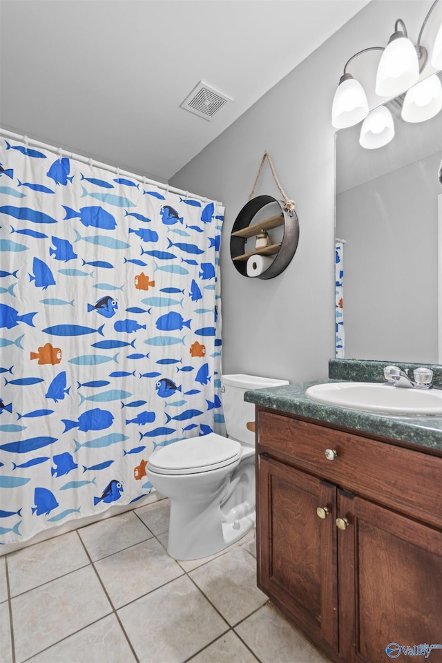 bathroom with tile patterned flooring, toilet, vanity, visible vents, and a shower with curtain