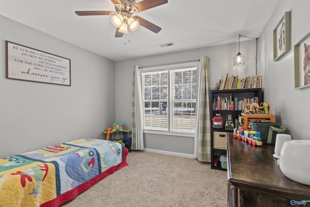 bedroom with carpet floors, a ceiling fan, visible vents, and baseboards