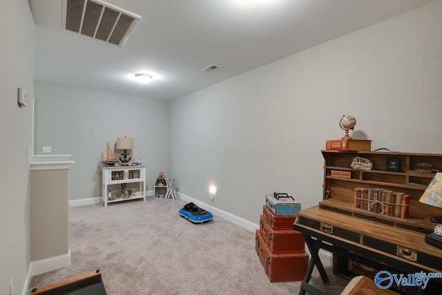 interior space with carpet, visible vents, and baseboards