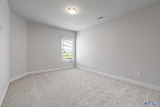 empty room with light carpet