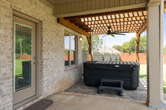 view of patio / terrace with ceiling fan and a pergola