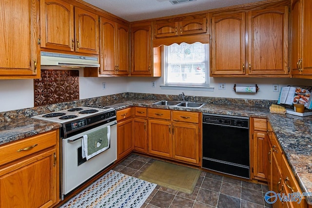 kitchen featuring dishwasher, dark stone countertops, sink, and white electric range