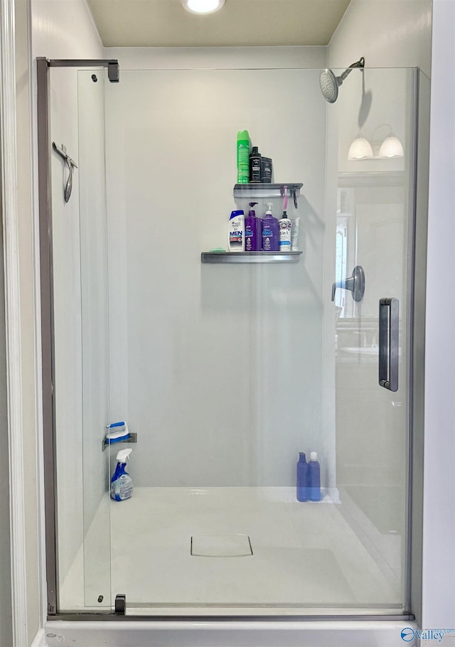 bathroom featuring an enclosed shower