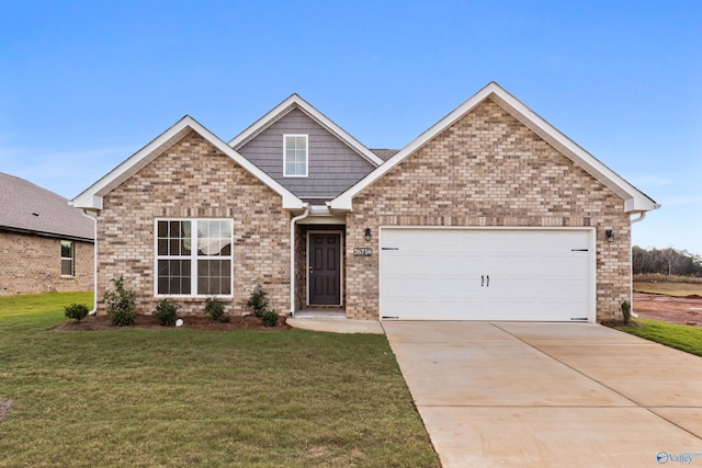 craftsman house featuring a garage and a front yard