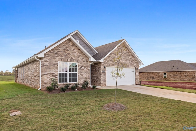 view of front of property with a garage and a front yard