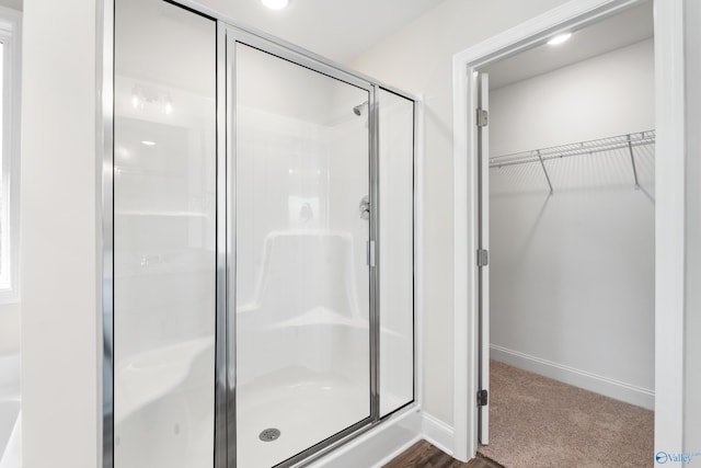 bathroom with an enclosed shower