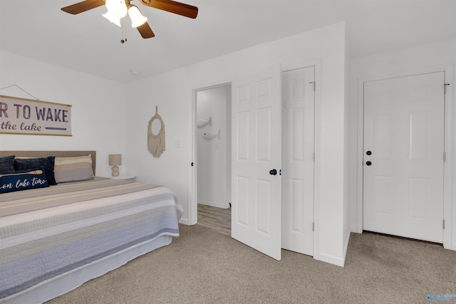 bedroom featuring baseboards, carpet, and a ceiling fan