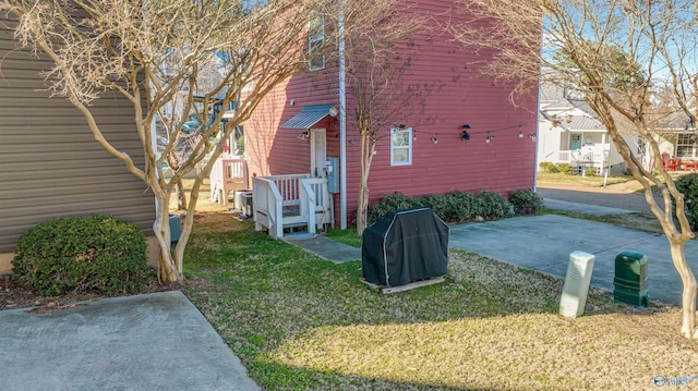 view of home's exterior featuring a yard